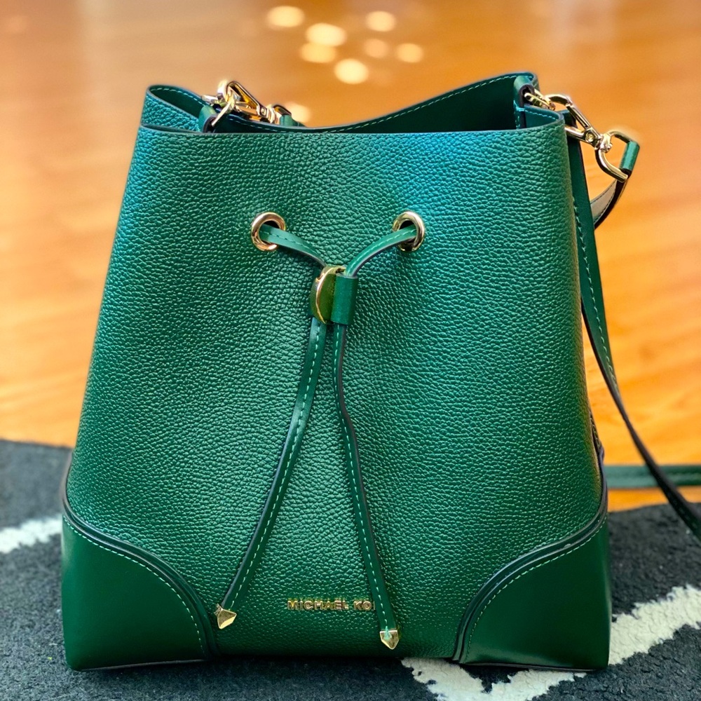 Excellent condition Michael Kors Bucket Bag. Hunter Green. Hard to find.